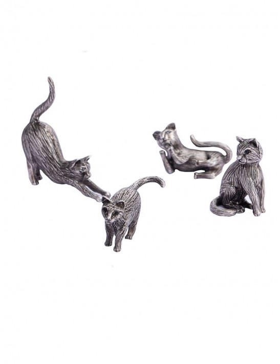 A punce of Cats to adorn the small nooks and cranies in your house to sneak into and snuggle .